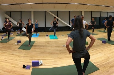 Photo of students doing yoga