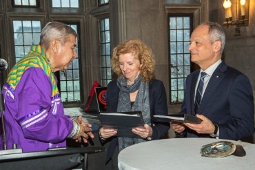photo of elder with provost and president