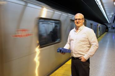 photo of Evans on subway platform