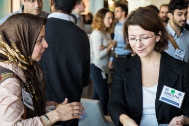 Photo of two women talking at Pillars of Health event