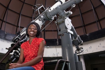 Margaret Ikape and telescope