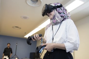 Photo of student using VR equipment