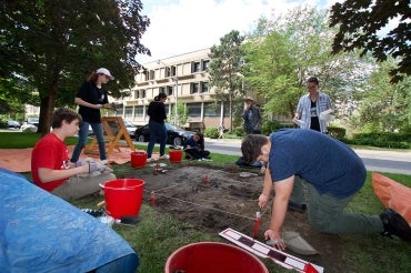 Photo of excavation outside archeology building