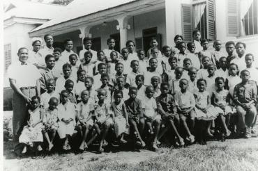 Andrew Foster with students from the boarding school for deaf children in 1961
