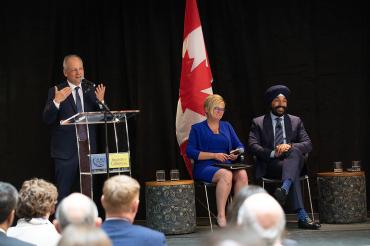 Photo of Meric Gertler addressing BHER event