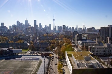 Toronto skyline in fall as seen from bloor st looking south to the cn tower