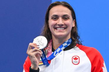 Kylie Masse holds her silver medal at the 2020 Tokyo Olympics