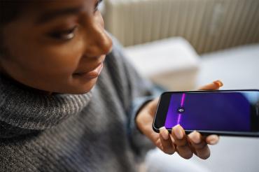 A woman talking into her phone.