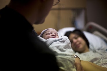 man holding his baby