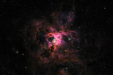 A false-colour image of the “Tarantula Nebula” taken in visible and ultraviolet light by the SuperBIT telescope shortly after launch.