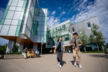 Two U of T students in conversation.