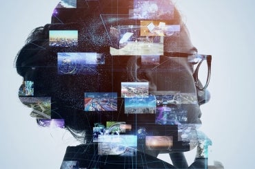 A composite image of a woman's head with multiple screens floating above it.