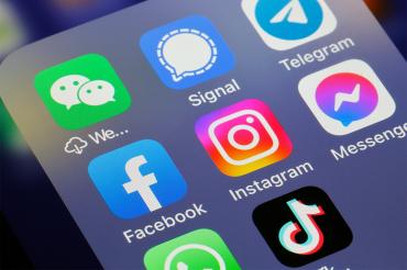 phone screen showing various social media icons