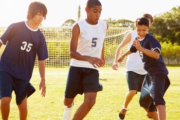 Children playing soccer