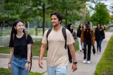 two students walking to UTSC