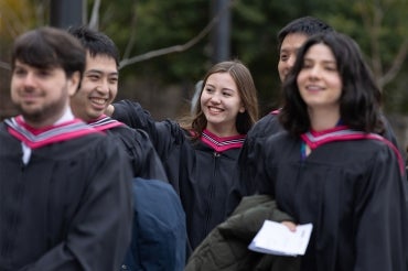 graduands line up outside convocation hall at the university of toronto