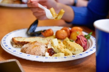 plate filled with various foods at the event