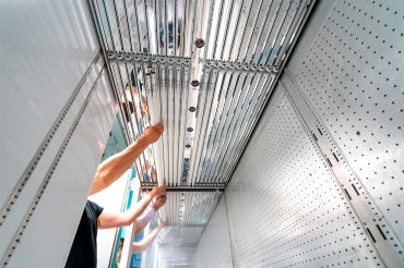 LED light tubes being installed