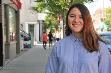 Photo of Cecelia Pye on street looking toward camera