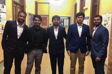 Group shot of the U of T students behind the RoboBin