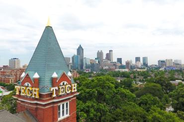 Tech tower in the foreground and the Atlanta skyline in the background