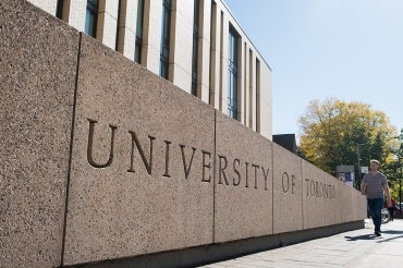 Photo of University of Toronto sign on building