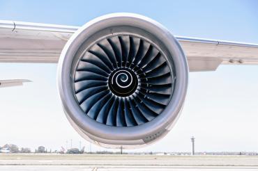 Sustainability plan to offset aircraft CO2 emissions: Close up of an airplane jet engine