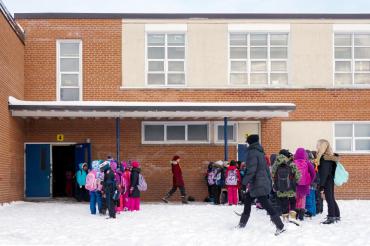 photo of children outside a school