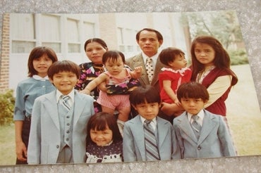 Associate Professor Nhung Tuyet Tran with her family in Michigan soon after arriving in America as a Vietnamese refugee. She is pictured standing in the bottom row with her brothers (photo courtesy of Nhung Tuyet Tran) Associate Professor Nhung Tuyet Tran with her family in Michigan soon after arriving in America as a Vietnamese refugee. She is pictured standing in the bottom row with her brothers (photo courtesy of Nhung Tuyet Tran)