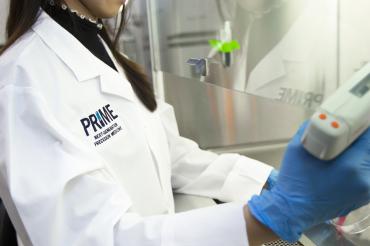a woman wearing a lab coat