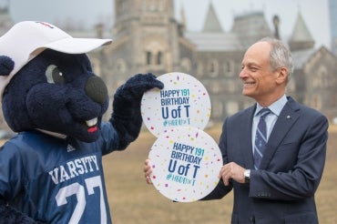 Photo of U of T President Meric Gertler and mascot