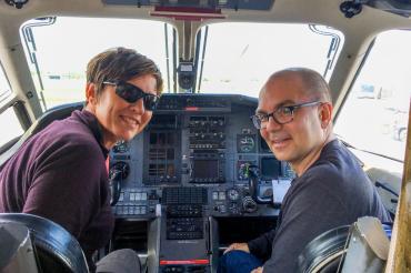 Tracey Galloway and Chris beck in the cockpit of a plane