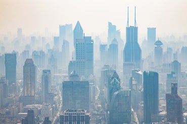 photo of smog with highrises in the background