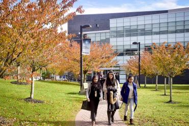 Students walking at UTSC campus during the fall