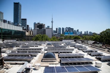 solar panels seen on the roof of the exam centre at the University of Toronto, St. George Campus