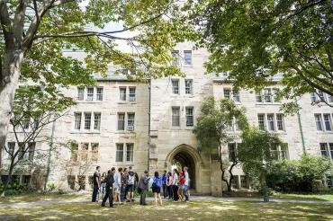 students gather outside of St. Michael's College