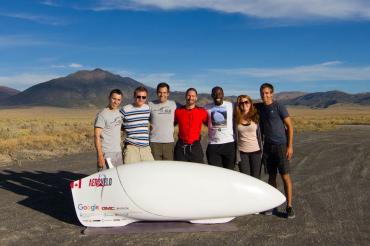 Aerovelo team poses with the Eta vehicle