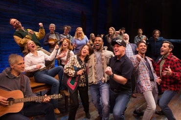 Come From Away cast on stage