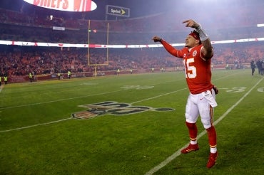 Photo of Kansas City Chiefs quarterback Patrick Mahomes celebrating on the field