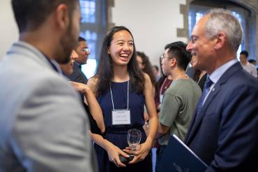 Pearson Scholar laughing with Meric Gertler