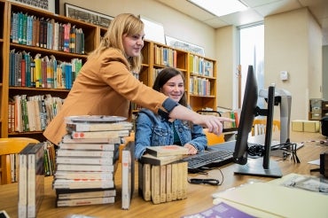 OISE librarians Nailissa Tanner and Jenna Mlynaryk