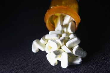 pills spilling out of a bottle