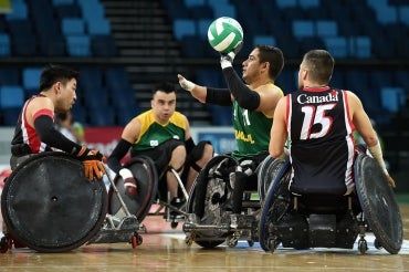 Brazilian and Canadian rugby players at a test event for the 2016 Paralympics