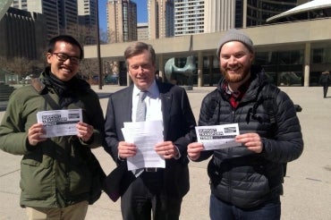 Mayor Tory with planning students holding a petition