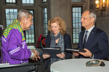 photo of elder with provost and president