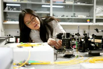 Li Qian working in a lab setting
