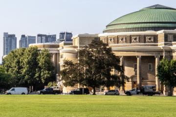 Exterior of convocation hall and city buildings in the summer season