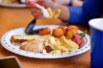 plate filled with various foods at the event