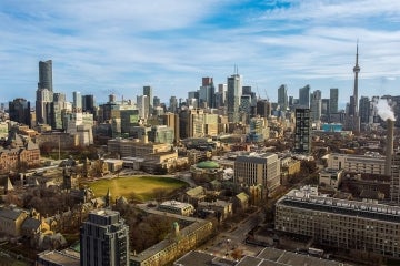 An aerial shot of downtown Toronto with U of T's St. George campus in the centre