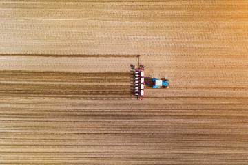 aerial view of a tractor planting a field